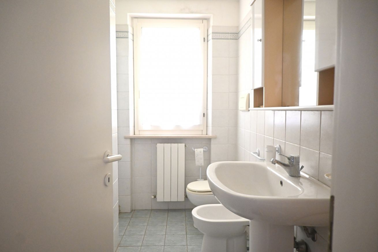 Regadera, bidet, toallas 