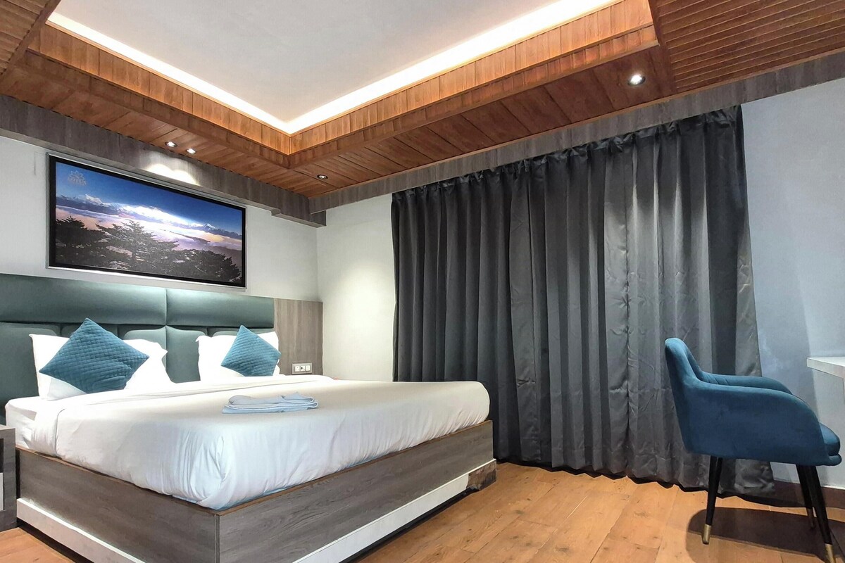 Deluxe kamer, uitzicht op stad | Beddengoed