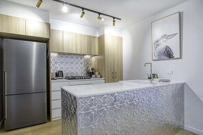 Coffee/tea maker, fridge, microwave, oven - Stylish Branx Apartment in Braddon (Braddon)