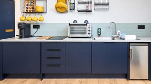 A modern kitchen with a built-in toaster, a sink, and a dishwasher. - Central 1-bed Apartment, Sleeps 3 Near Parking (Bournemouth)