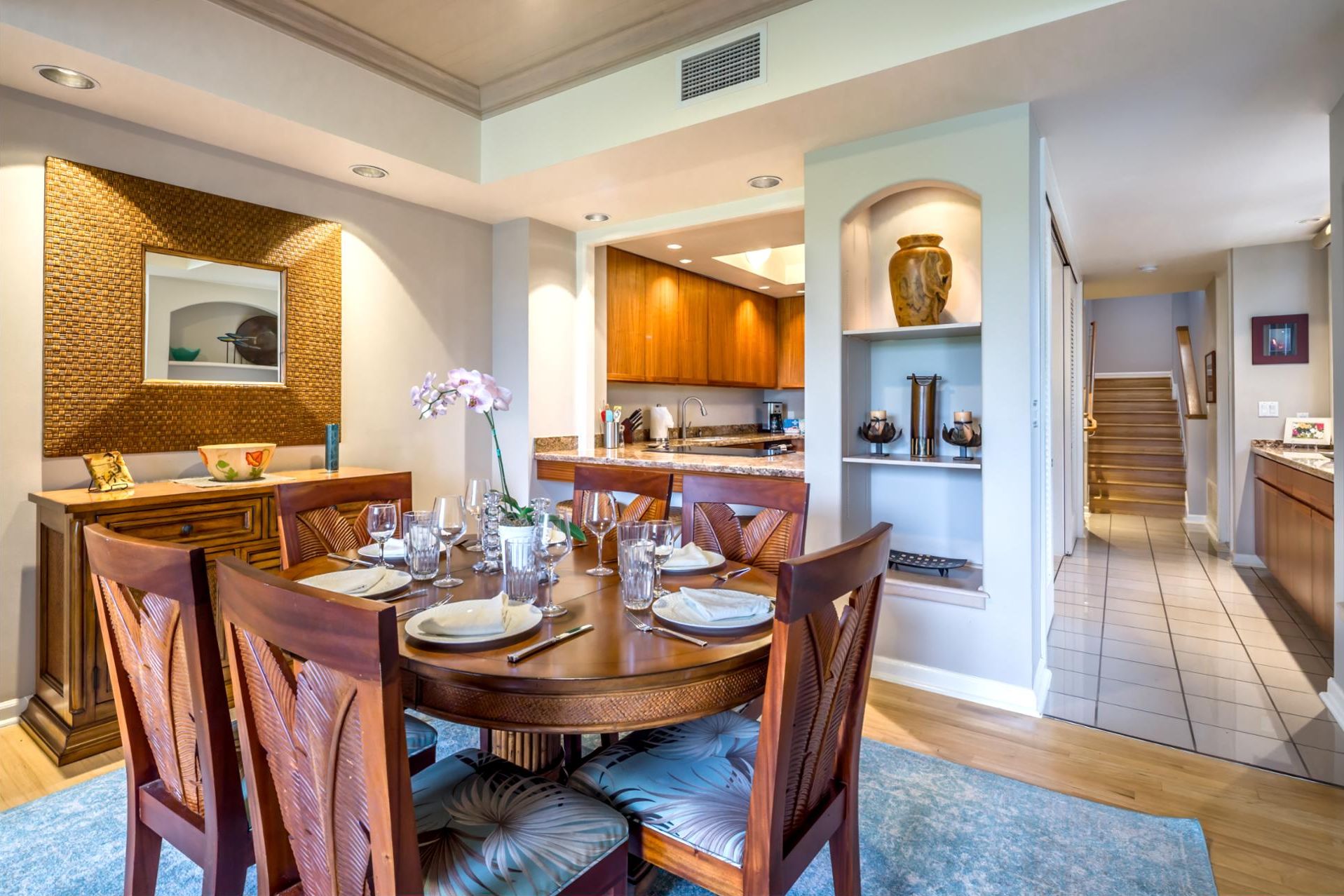 Gather around the beautiful wooden dining table for memorable vacation dinners.