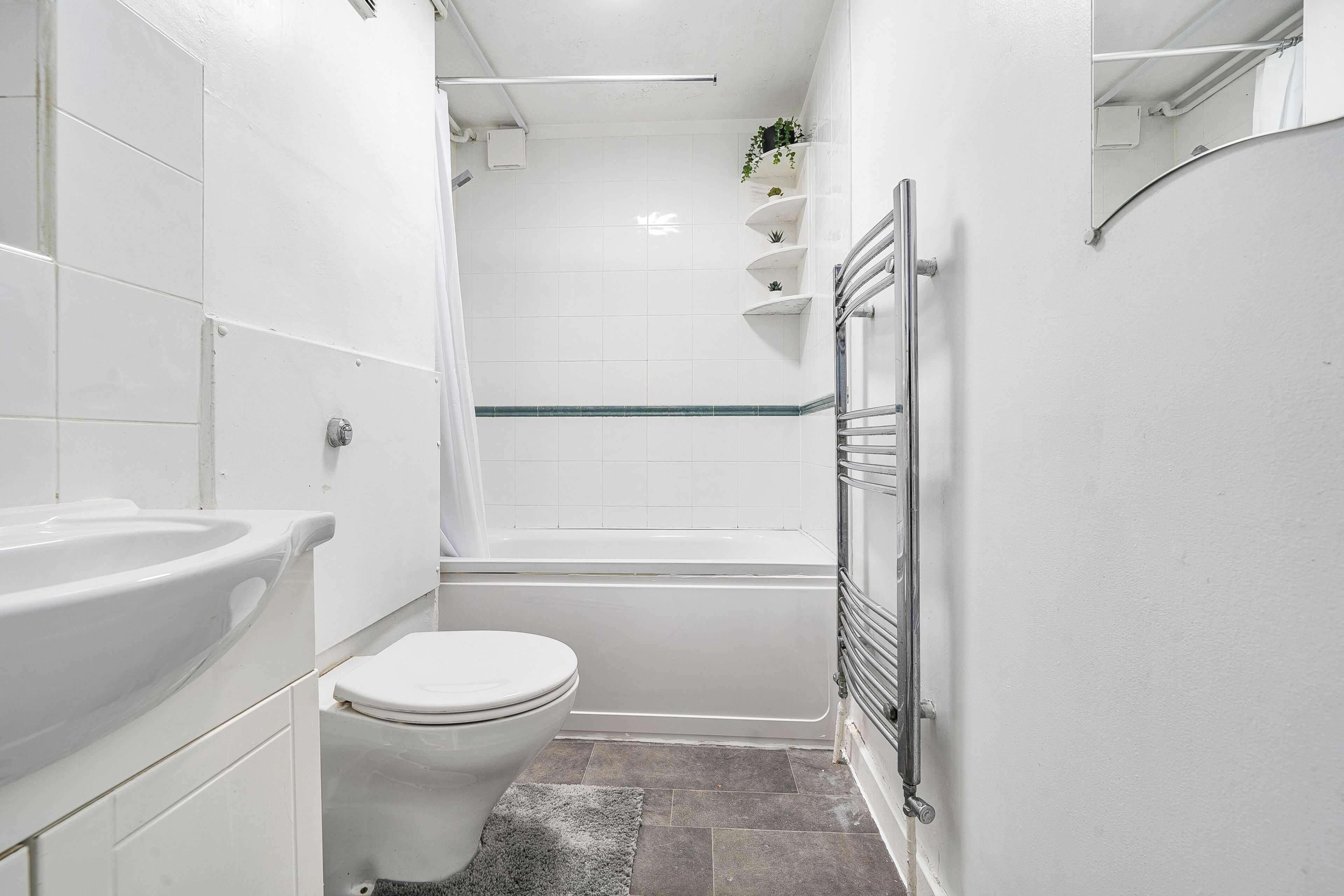 Separate bathtub and shower, deep-soaking bathtub, hair dryer, towels