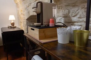 Interior - Grotta Paradiso, a two-story stone cottage with a warm and cozy charm. (Molfetta)