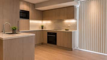 Standard Apartment | Private kitchen | Fridge, microwave, oven, stovetop