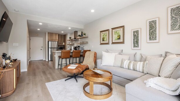 A modern living room with a sofa, coffee table, and dining area. - Condo on property at LaCosta Golf Resort & Spa with Pool 680 (Carlsbad)