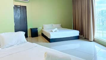 Deluxe Quadruple Room, City View | Iron/ironing board, free WiFi