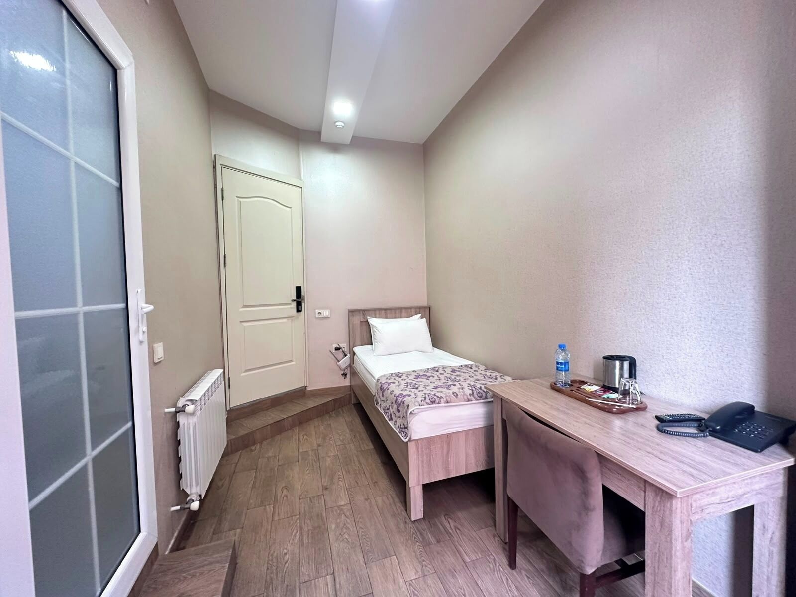 Standard Single Room, Garden View | Desk, iron/ironing board