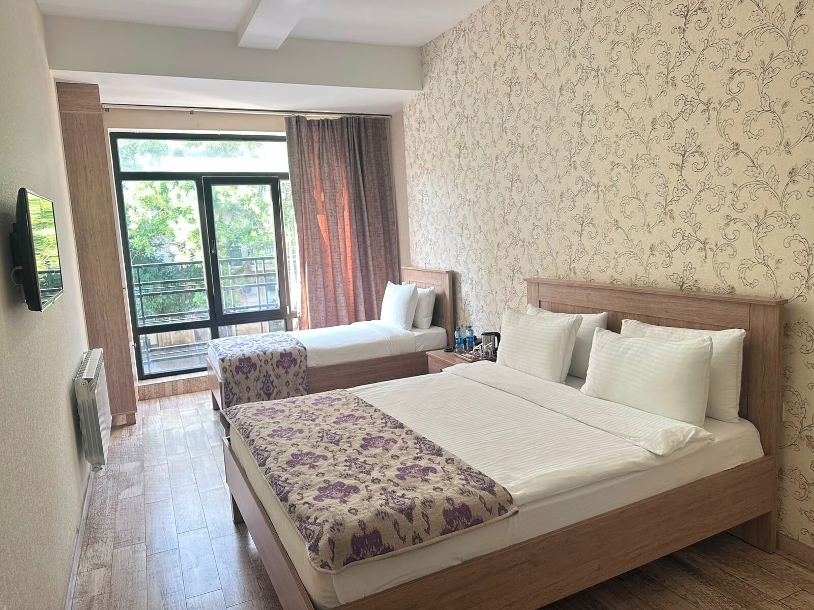 Standard Triple Room | Desk, iron/ironing board