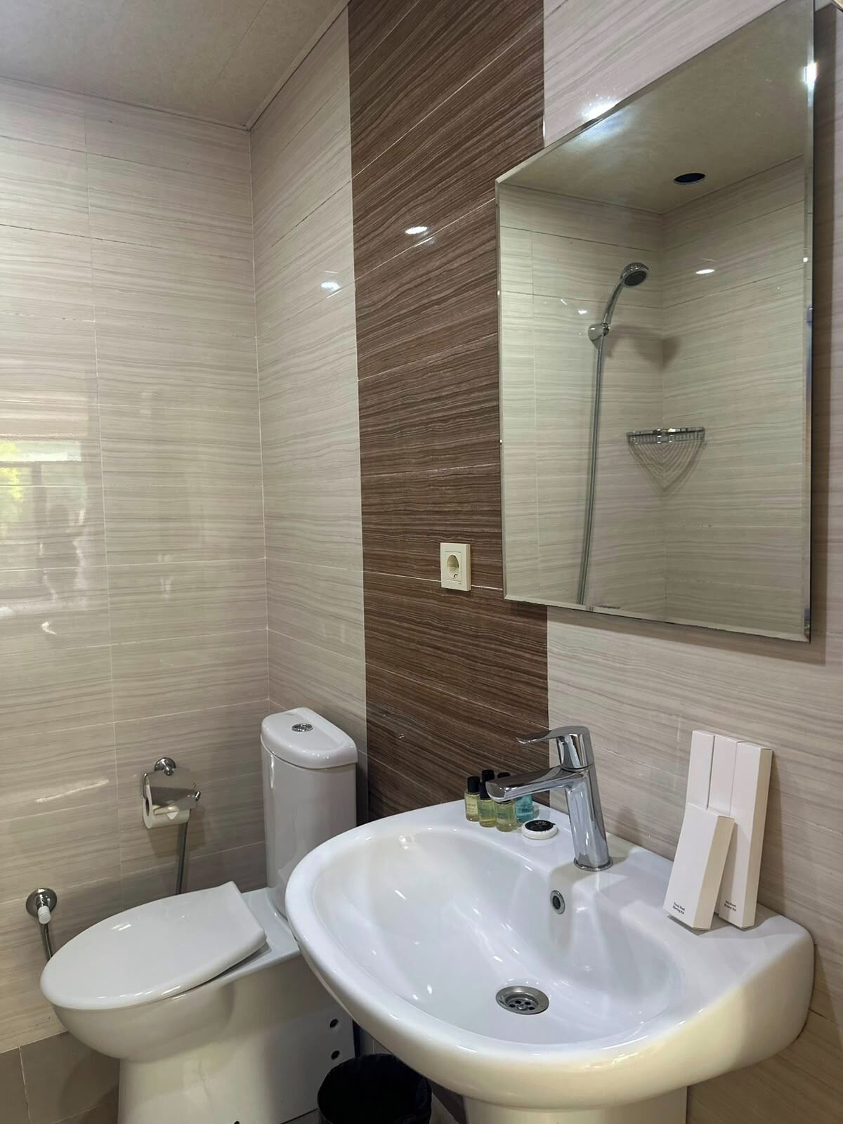 Shower, slippers, towels, soap