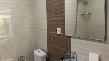 Shower, slippers, towels, soap