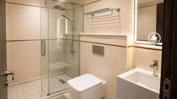 Deluxe Quadruple Room, City View | Bathroom | Separate tub and shower, towels, soap, shampoo