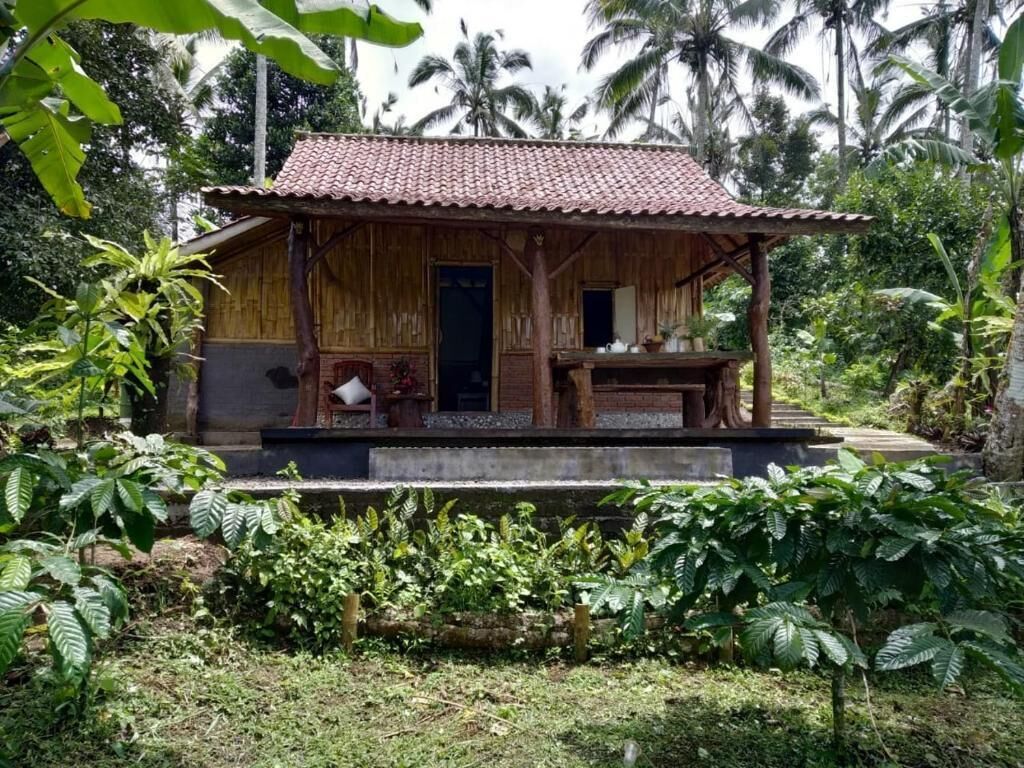 Deluxe-Ferienhütte, Balkon, Gartenblick | Außenbereich