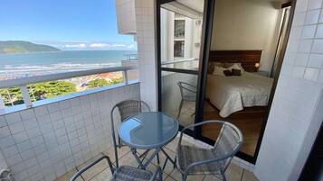 Deluxe Apartment, Balcony, Beach View | Outdoor dining