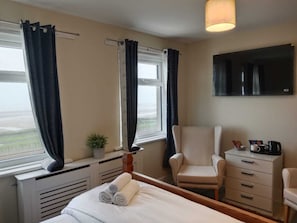 Deluxe Double Room, Sea View | Blackout curtains, iron/ironing board (on request), free WiFi
