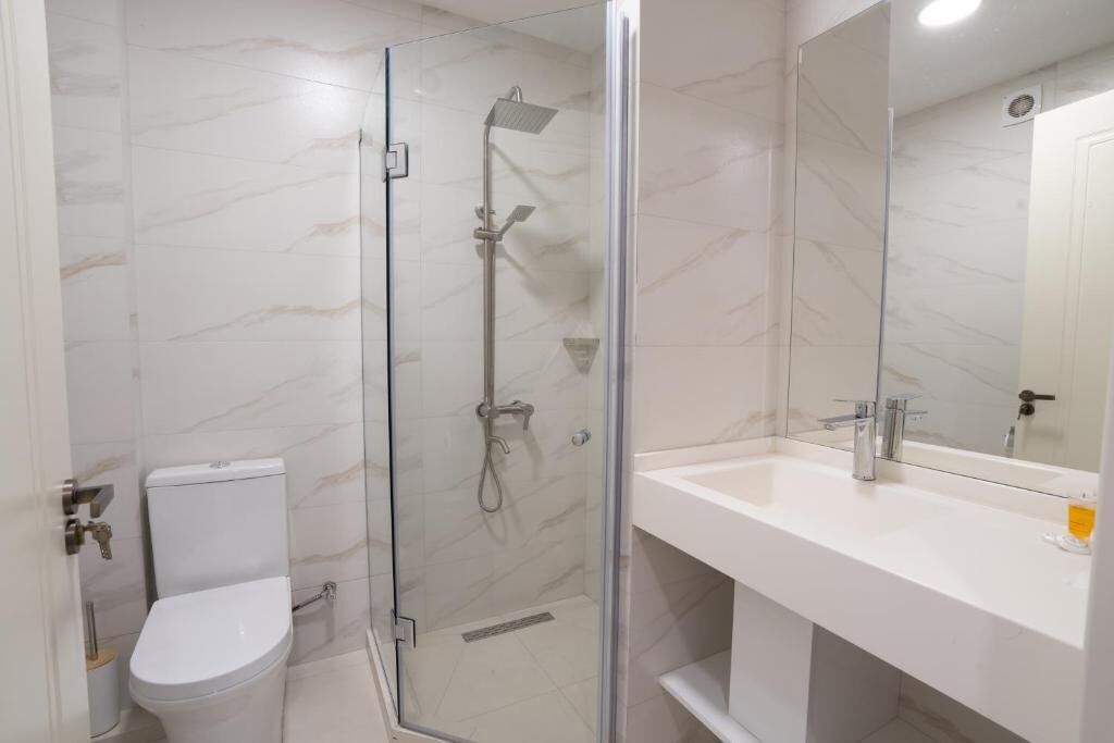 Twin Room, City View | Bathroom | Slippers