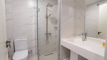 Twin Room, City View | Bathroom | Slippers