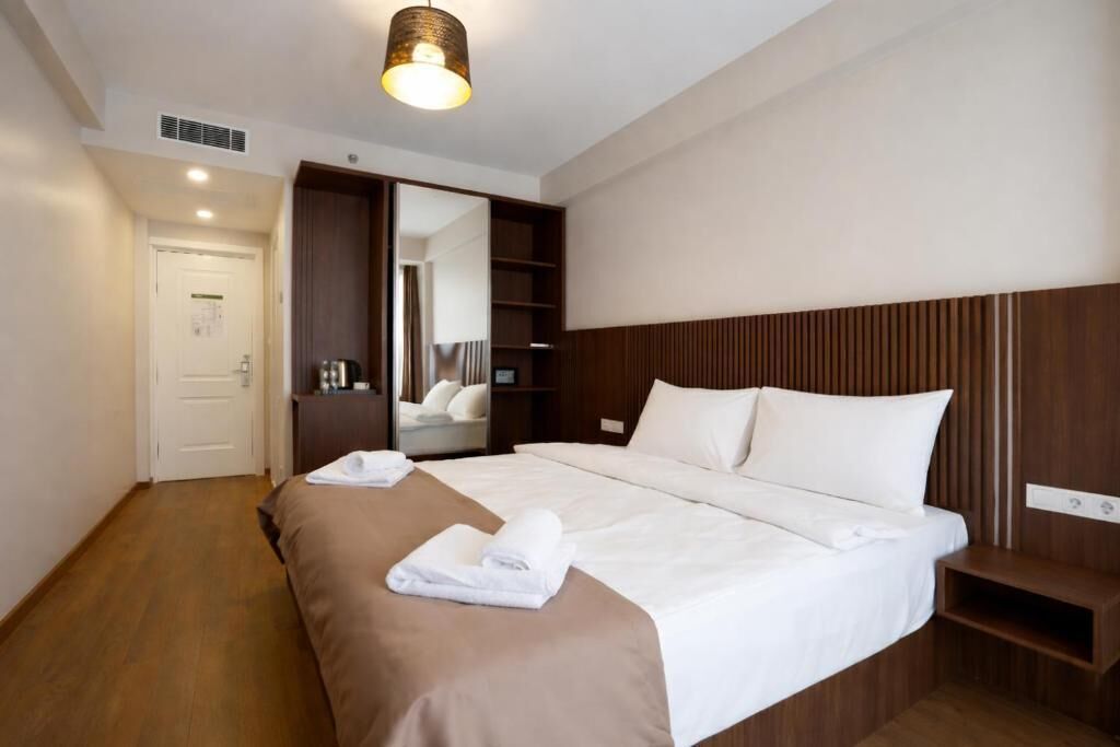 Double or Twin Room, City View | In-room safe, soundproofing, iron/ironing board, free WiFi