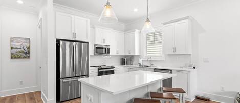 Coffee/tea maker, fridge, microwave, oven