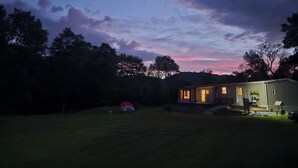 A residential property with a house, a tent, and a lawn. - Secluded Vermont Escape – Mins to River, Trails, & Foliage (Sharon)