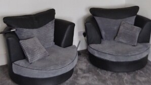 A room with two black armchairs, a white ceiling lamp, and a framed picture on the wall. - 2nd Floor, Train Stn, Beach, Cumbrae-Millport Ferry Port All Under 0.3 Mile. (Largs)
