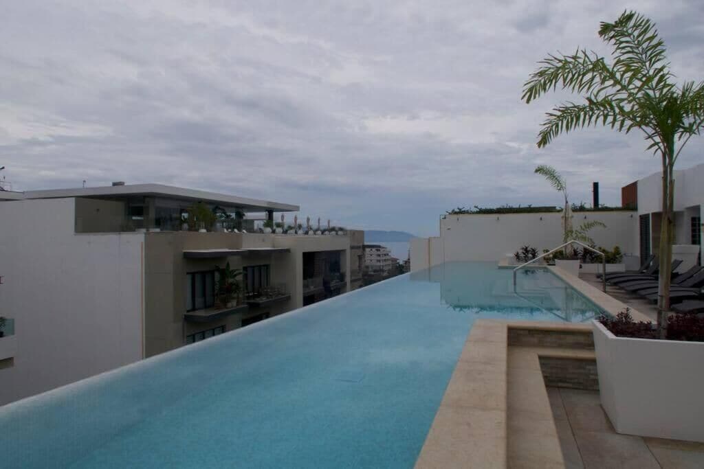 Outdoor pool, pool umbrellas, pool loungers