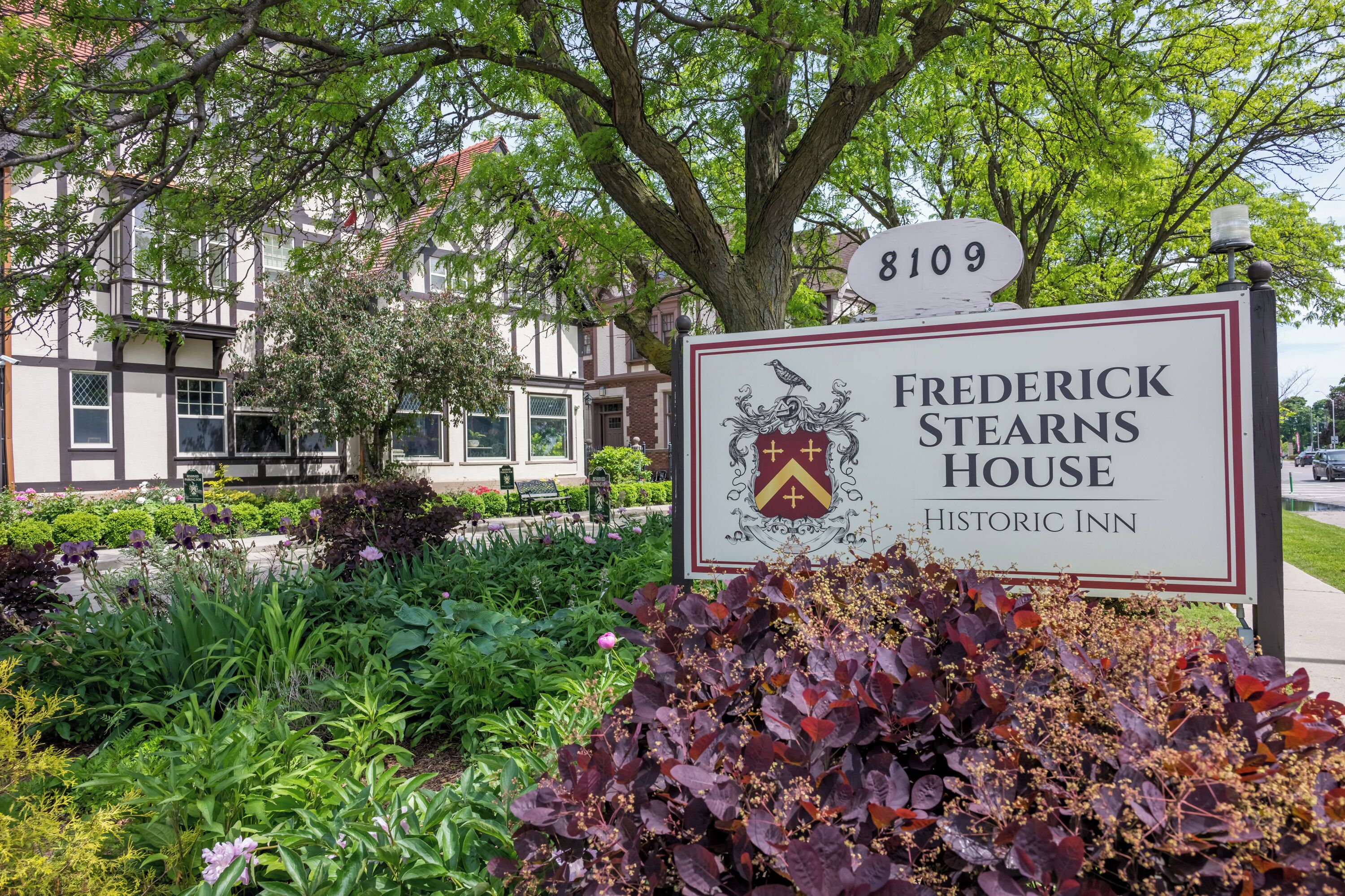 A sign for Frederick Stearns House, a historic inn, with a number 8109.