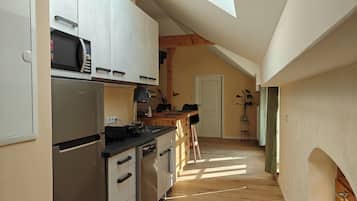 Departamento | Cocina privada | Cafetera y tetera, refrigerador, microondas y horno