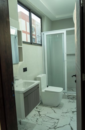 Luxury Apartment, Balcony, City View | Bathroom | Combined shower/tub, free toiletries, slippers, towels - JS WAY APARTMENT EAST AIRPORT (Accra)