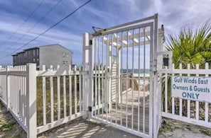 A gated entrance with a sign indicating 'Gulf Winds East Owners & Guests Only.' - Gulf Winds East #12 - Pearl of the Sea (Miramar Beach)