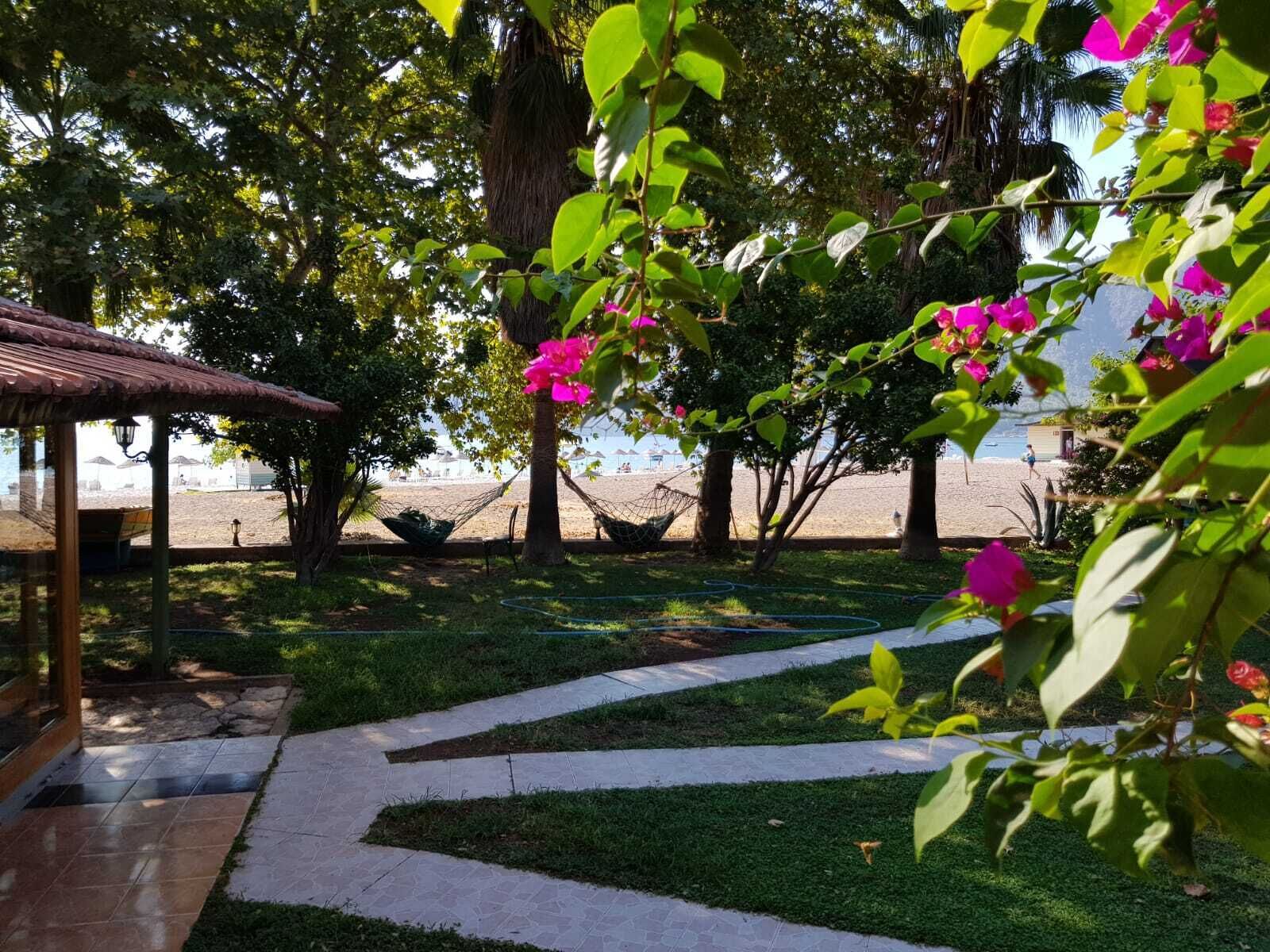 Classic Bungalow, Multiple Beds, Patio, Beach View | Property grounds