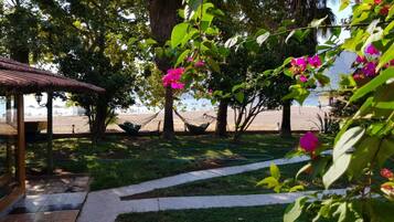 Classic Bungalow, Multiple Beds, Patio, Beach View | Property grounds