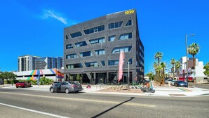 A modern building with a flat roof and multiple windows, marked with the number 1030. - Phoenix Rustic Urban Retreat (Phoenix)