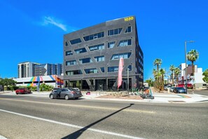 A modern building with a flat roof and multiple windows, marked with the number 1030. - Phoenix Rustic Urban Retreat (Phoenix)