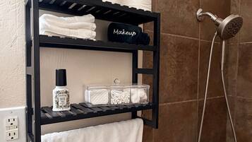Hair dryer, towels, soap, toilet paper