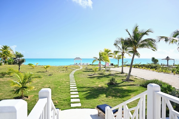 Welcome to Leisure Beach Ocean Retreat, steps from the warm, calm Caribbean.