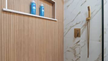 Eco-friendly toiletries, hair dryer, bidet, towels