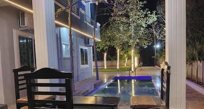 Spacious 4-bedroom farmhouse and banquet hall with AC kitchen available