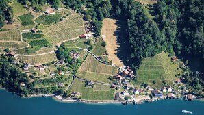 Aerial view - Tremondi Boutique BNB & Restaurant, (Quinten), by Interhome (Quinten)