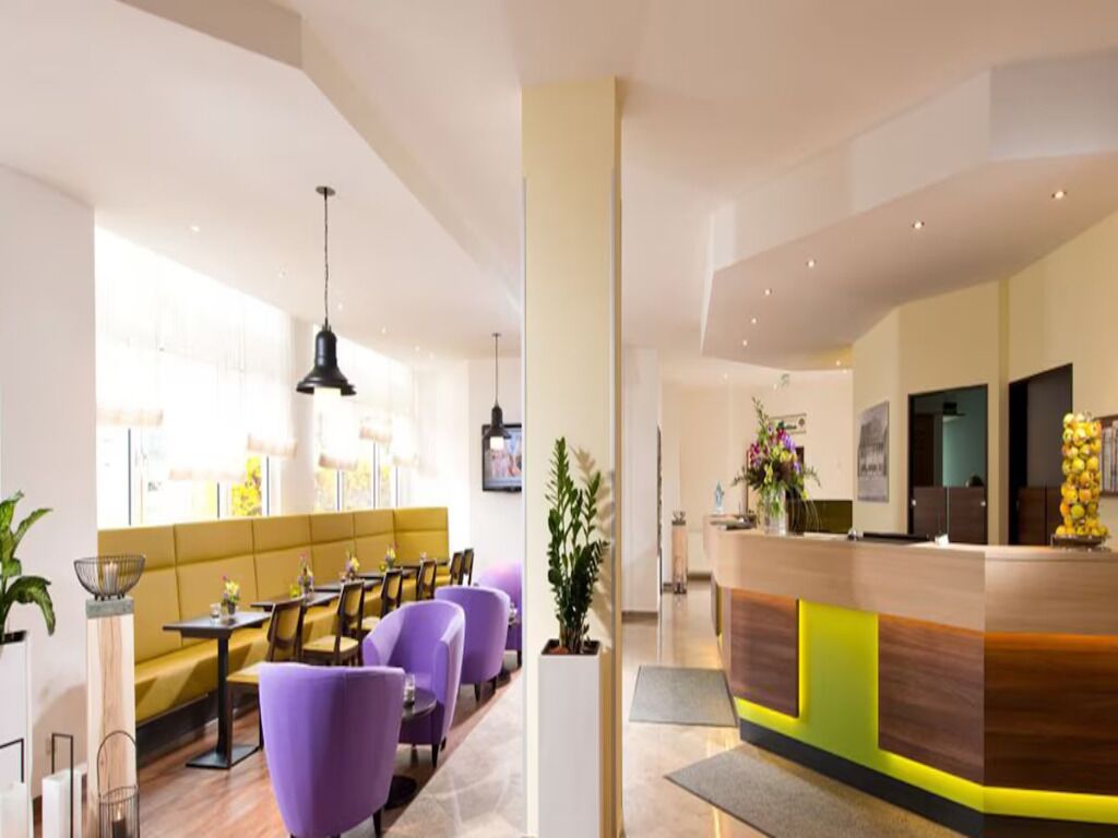 Linger in the bright lobby with comfortable seating and calm lighting.