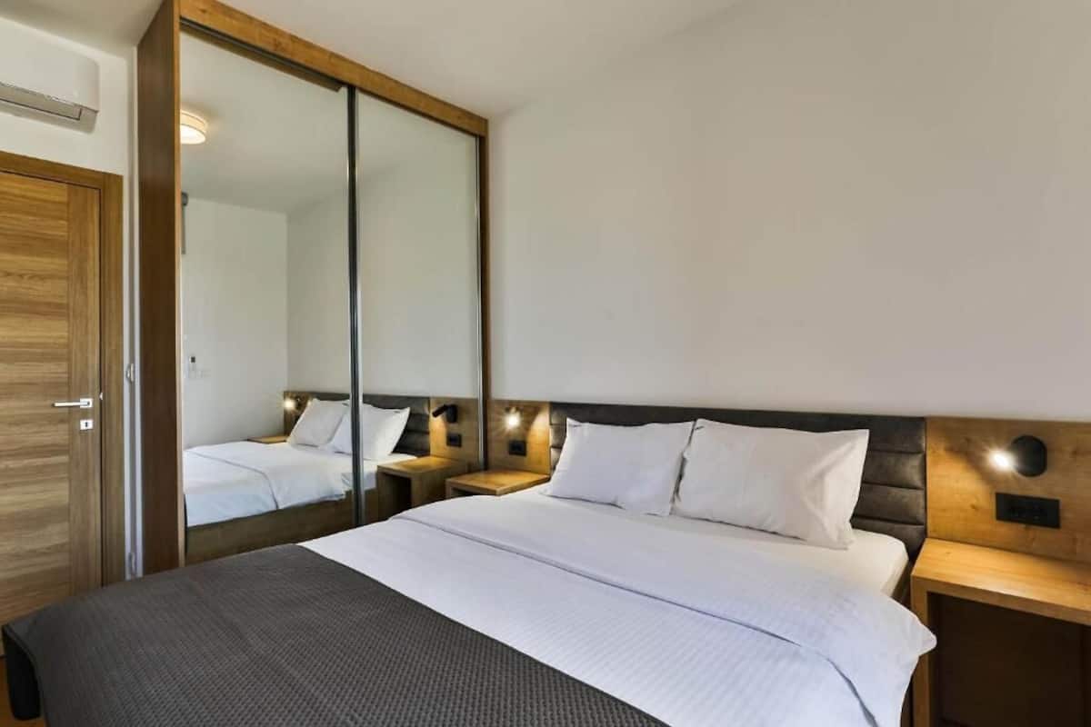 Basic Apartment, Balcony, City View | In-room safe, blackout drapes, soundproofing, iron/ironing board