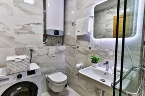 Superior Apartment, Balcony, City View | Bathroom | Slippers - Numa by Kraft (Podgorica)