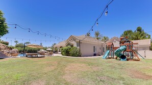 A residential area with a playground, outdoor seating, and a swimming pool. - 3 Mi to Dtwn Gilbert! Apt w/ Shared Poolside Oasis (Gilbert)