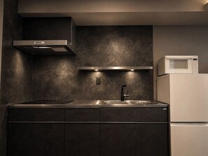 Fridge, microwave, stovetop, cookware/dishes/utensils