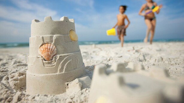 A sandcastle on a beach with a clear sky. - FABULOUS 2B/2B ISLAND CONDO! POOL! WALK TO BEACH! WALK TO EVERYTHING! (Fort Myers Beach)