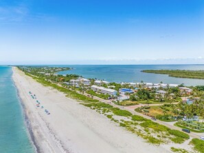 A coastal resort with beachfront properties, a road, and a marina. - 5 Bedroom / 5 Bath Luxury Estate (Captiva)