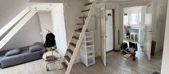 High-quality attic apartment in an older building near downtown (up to 2 people)