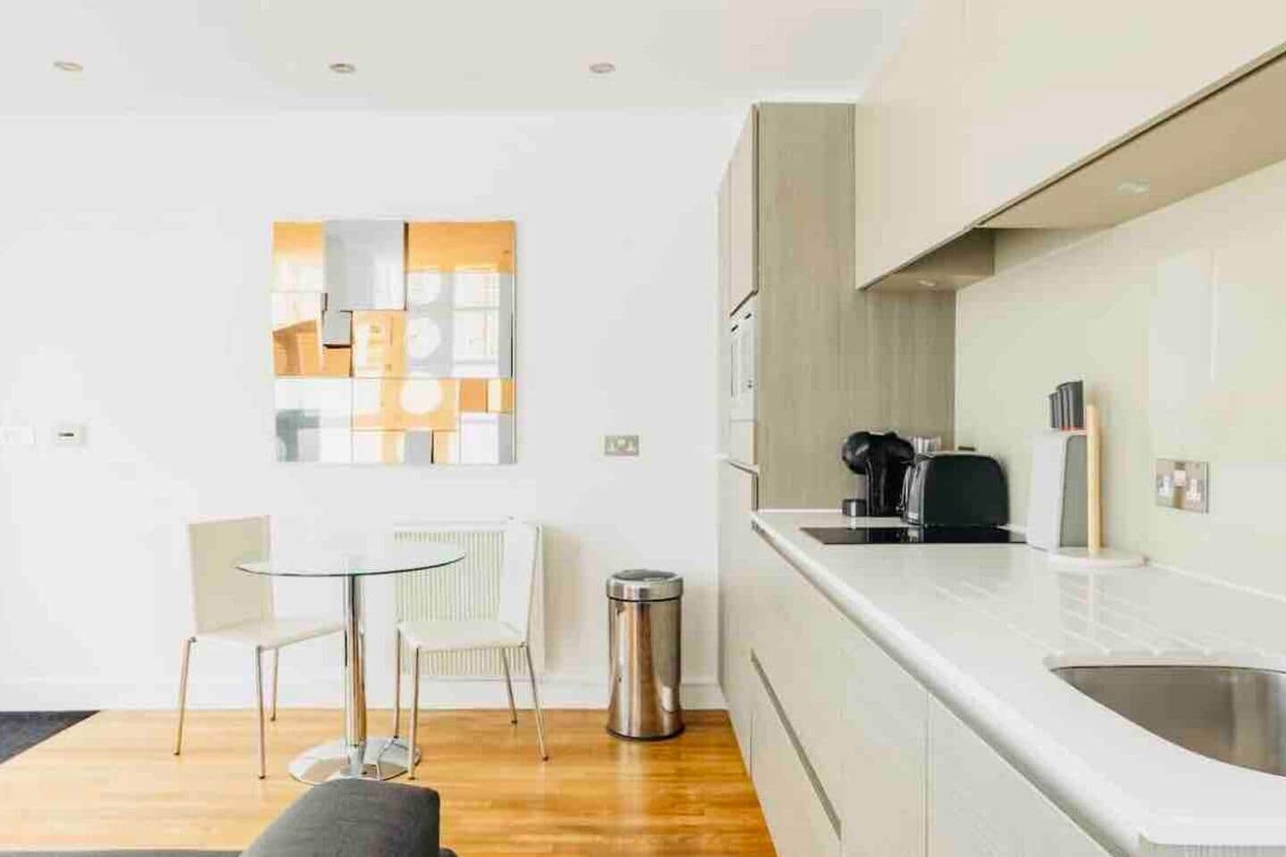 Coffee/tea maker, fridge, microwave, oven