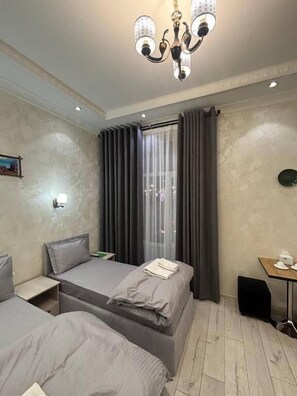 Chambre Triple Familiale, vue ville