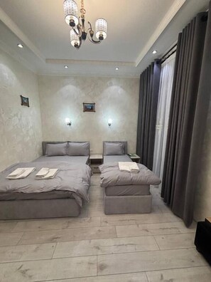 Chambre Triple Familiale, vue ville