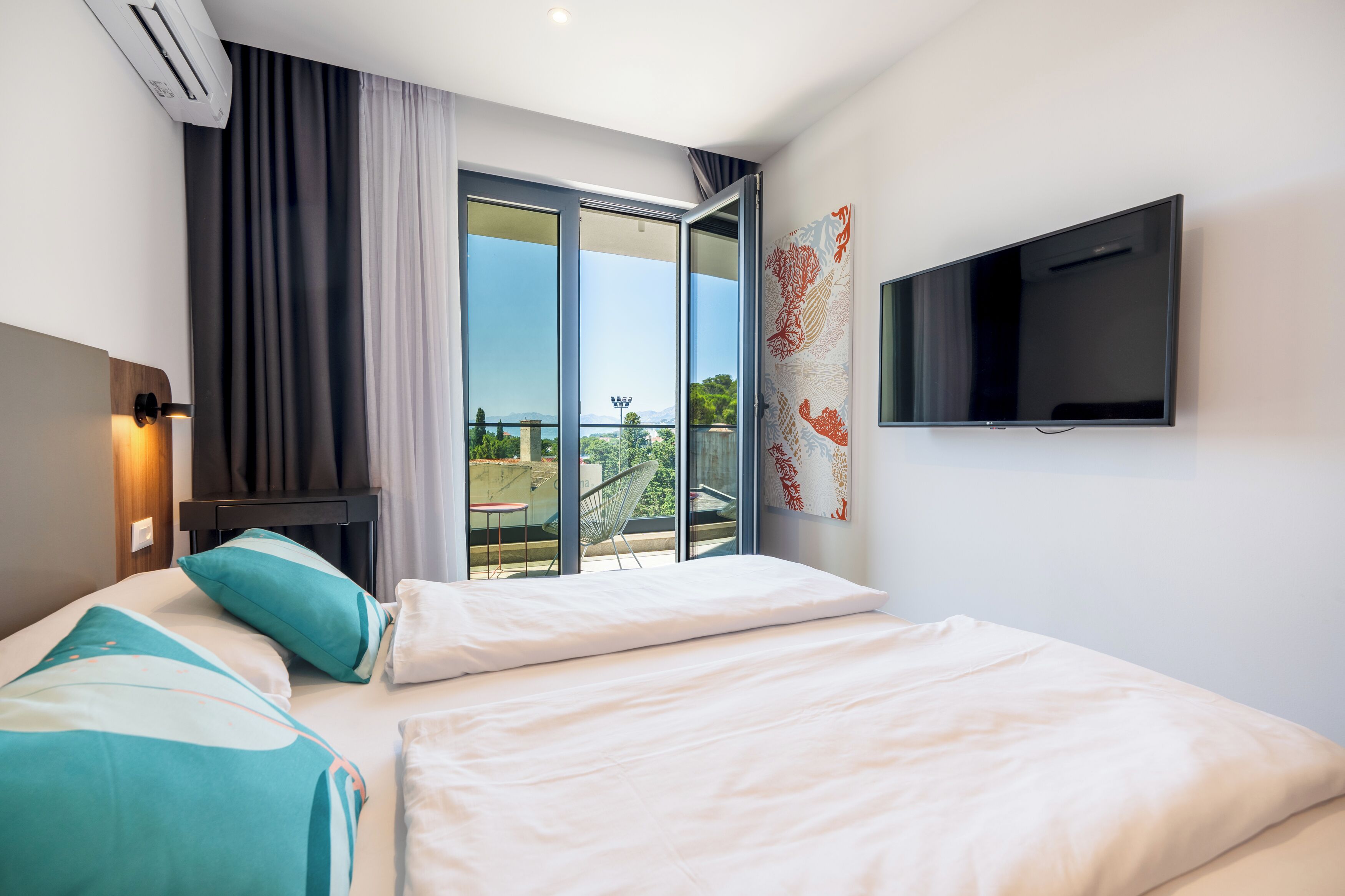 Comfort Apartment, Balcony, Courtyard View | In-room safe, iron/ironing board (on request), free WiFi